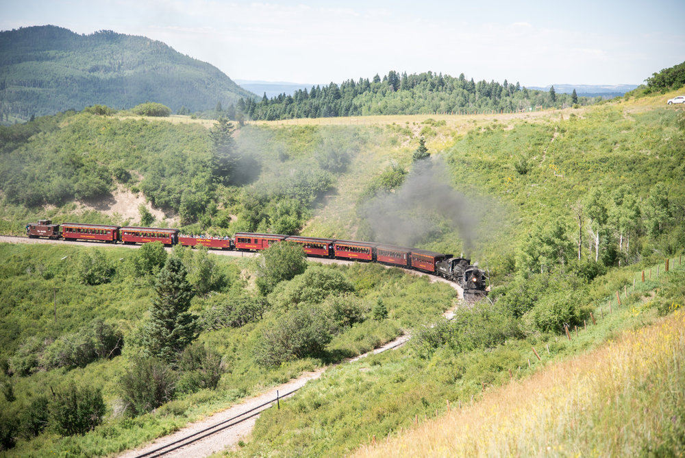 27 216 continues up the grade approaching Cresco.jpg