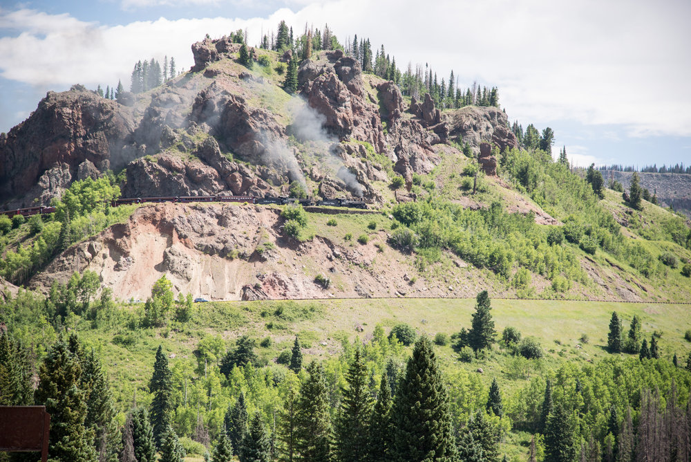 30 Train 216 rounds Windy Point as it nears the summit of Cumbres.jpg