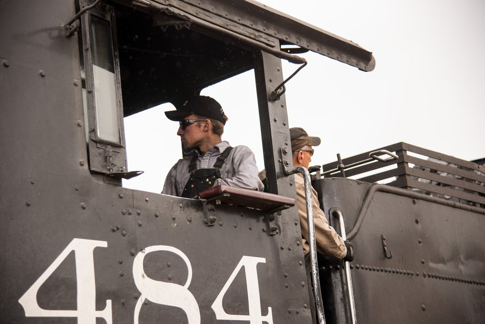 49 Student fireman sits in the left seat with his instructor standing behind.jpg