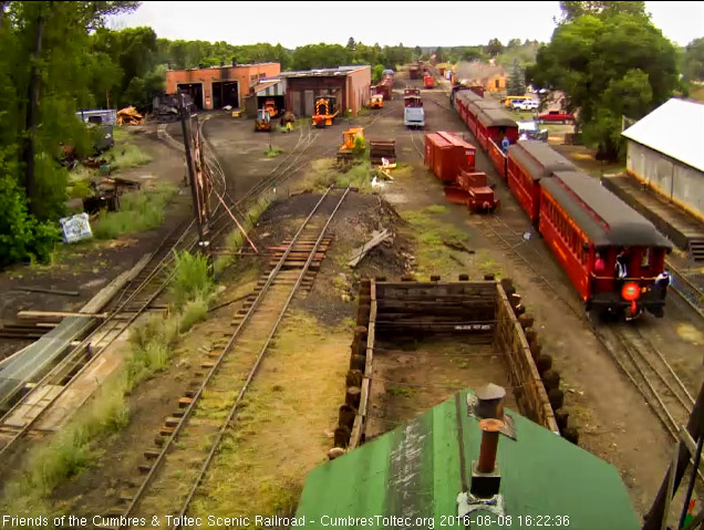 8.8.16 We see the car host in her white apron and the train crewman on the platform of the New Mexico.jpg