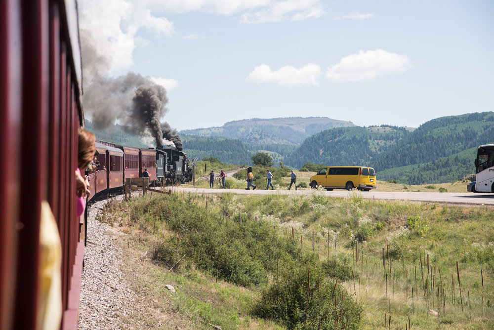 16 The train has stopped and Cinder Bear is walking over to get on with Conductor Ray waiting to assist.jpg