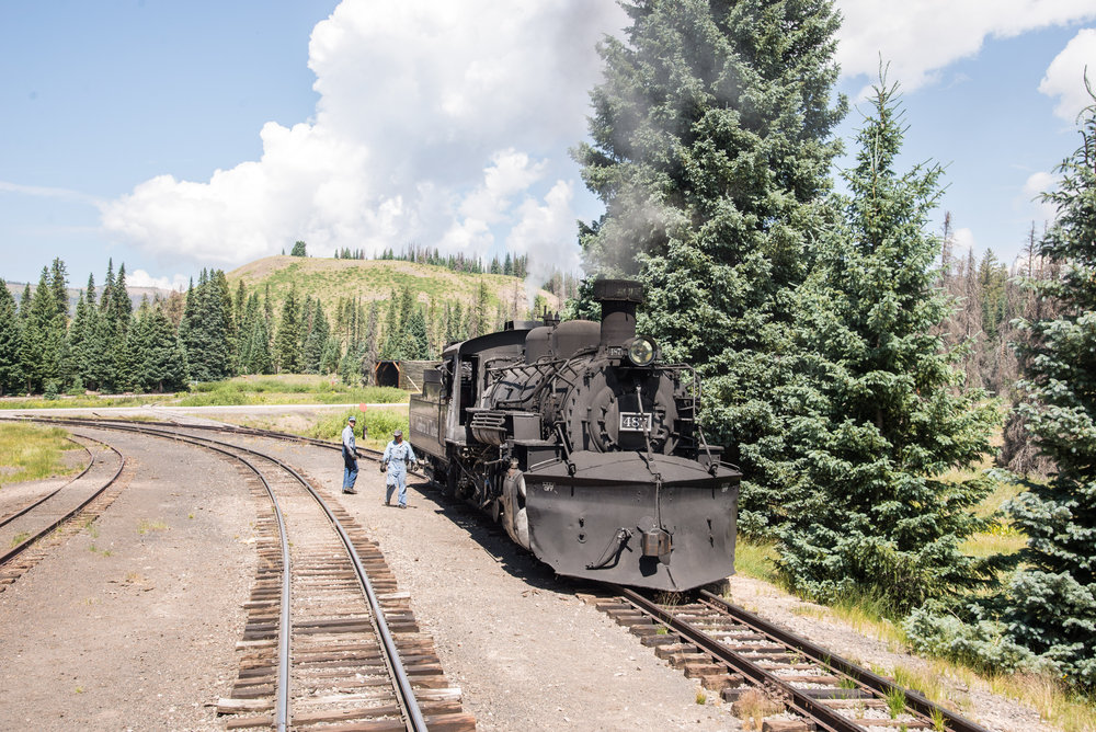 25 Helper 487 has cut off and moved into the siding before running the wye and heading back to Chama.jpg