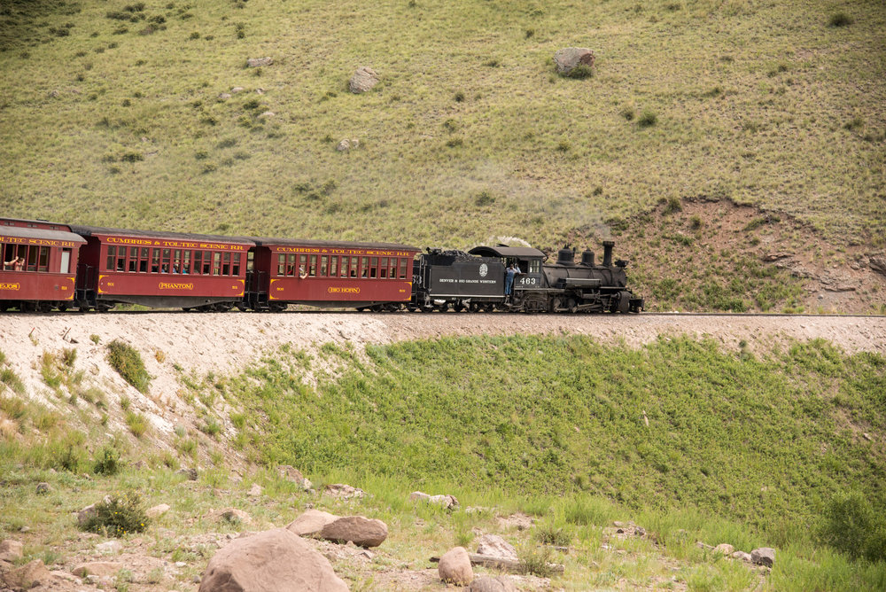 32 As the train rounds a curve, the fireman looks back to inspect the train.jpg