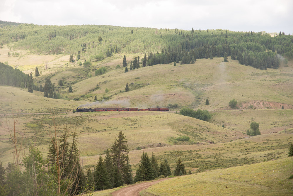 45 Lunch over we see train 215 with the 489 headed west to Chama.jpg