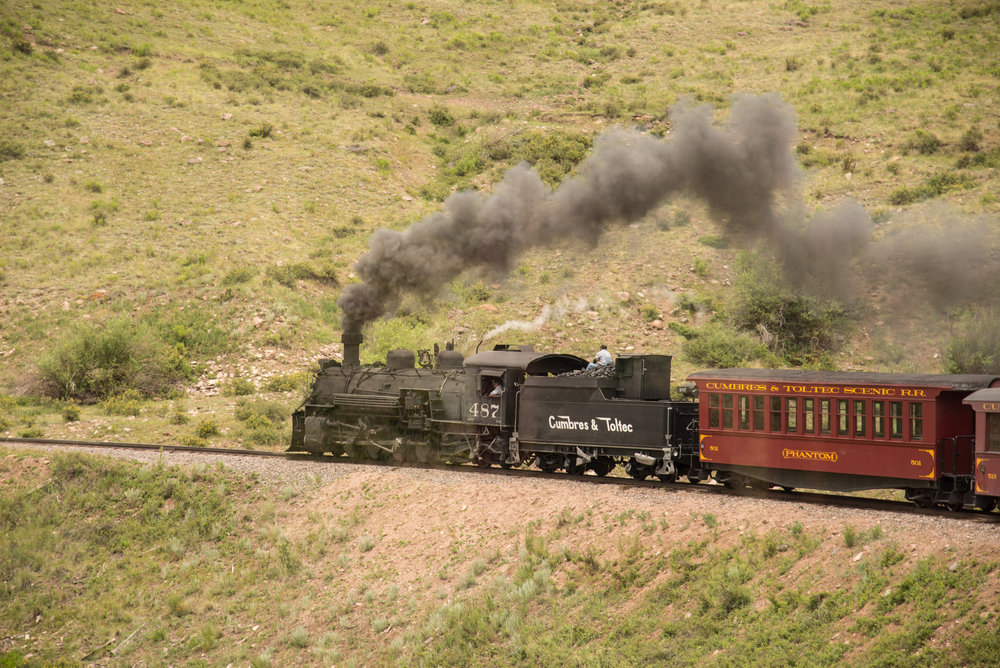 36 Leaving Osier 487 works to get the train up the grade, that is the instructor for the student fireman on the coal pile.jpg