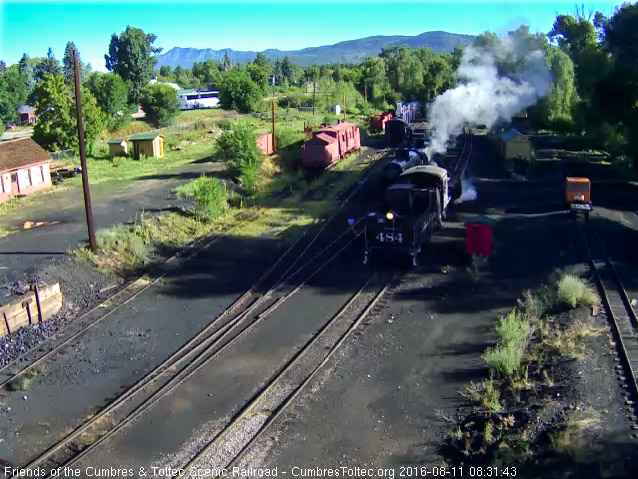 8.11.16 484 continues to move toward the coal lead switch as the Antonito bus passes in the background.jpg