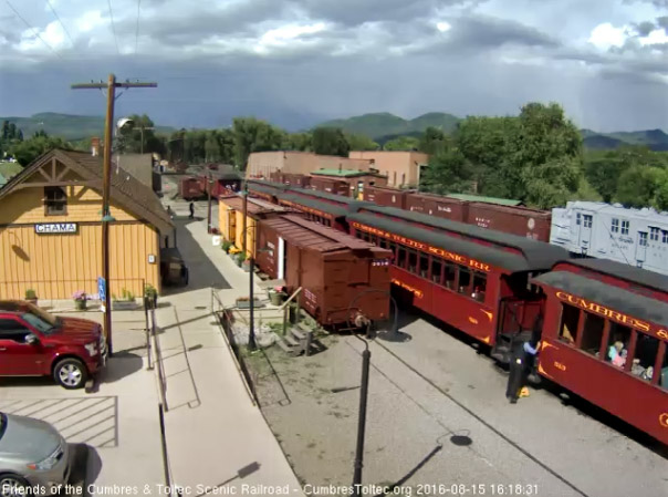 8.15.16 The conductor is placing the step box after the train stops.jpg