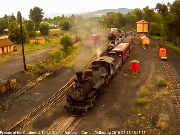 8.15.16 484 brings the school train into Chama with a slightly different consist.jpg