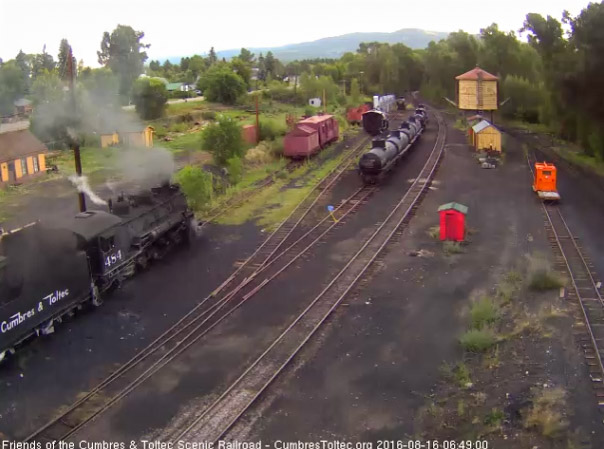 8.16.16 Even on this cool morning coal dust flys as the loader dumps.jpg