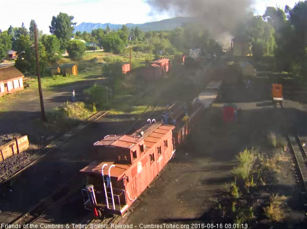 8.16.16 A smoke haze envelopes the student train as it heads out of Chama.jpg