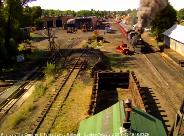 8.16.16 487 puts out a nice cloud of steam and coal smoke as it gets 216 underway.jpg