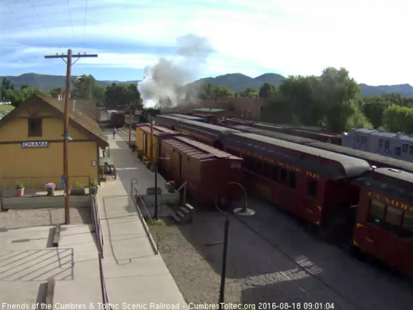 8.18.16 The 487 comes out of south yard with box car and coach from student train.jpg