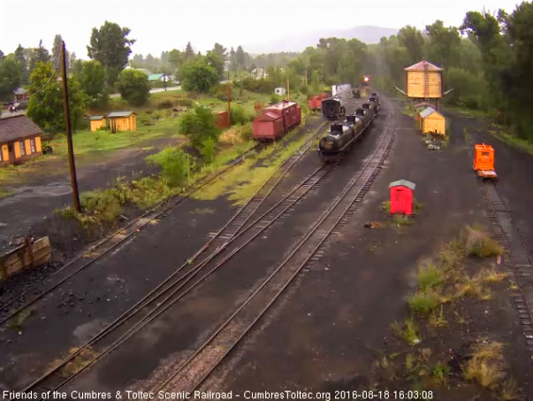 8.18.16 In a steady rail, 489 comes around the corner from the river to enter Chama yard.jpg