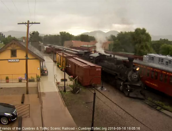 8.18.16 489 passes the depot as thunder rolls in the background.jpg