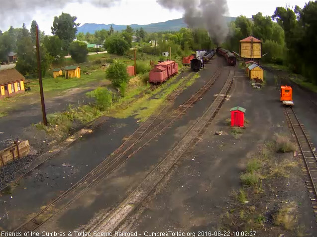 8.22.16 The 489 is exiting Chama yard as the parlor passes the tank.jpg