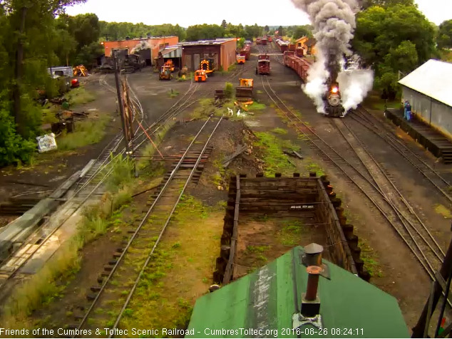 8.26.16 The caboose is clearing the switch as the 315 passes the wood shed.jpg