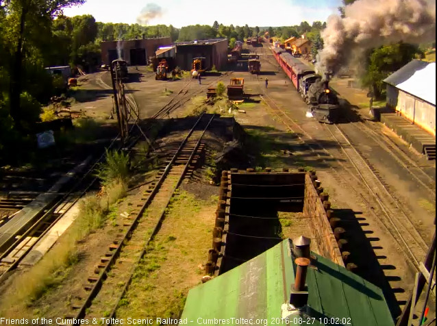 8.27.16 487 gets train 216 underway, note that steam escaping from the front of the locomotive.jpg