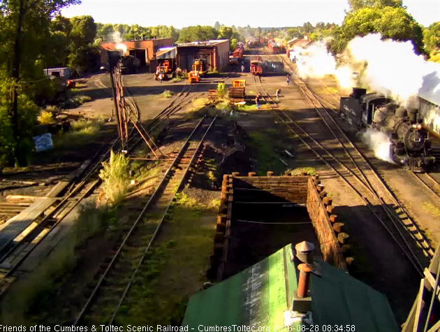 8.28.16 484 moves forward to the coal dock as the headlight of 463 is seen in south yard.jpg