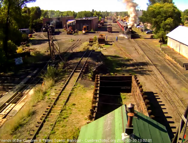 8.30.16 487 gets 216 moving away from the depot as we see 484 and 463 simmering quietly at the house.jpg