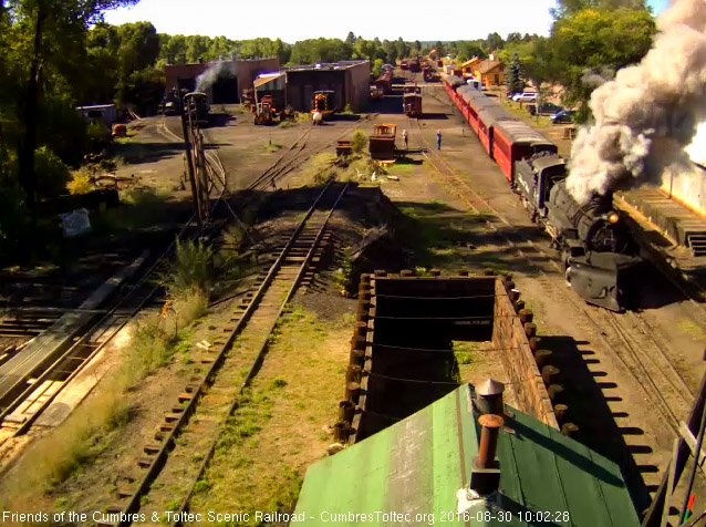 8.30.16 487 gives us a nice smoke and steam plume as it passes the wood shop.jpg