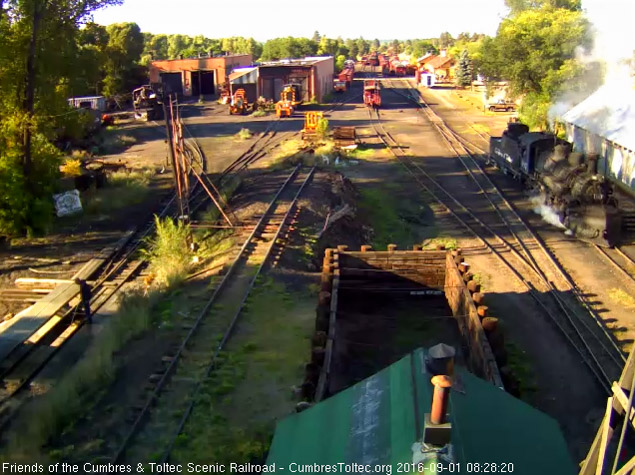 9.1.16 487 moves by the wood shop as it heads into the coal dock.jpg