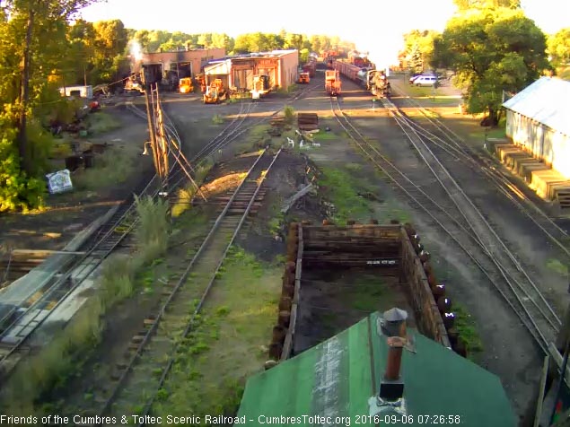 9.6.16 484 is now on the main with the consist still partially in south yard and ready to load.jpg