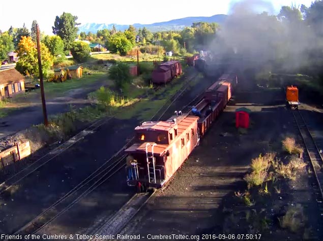 9.6.16 The caboose has one rider on the rear platform, probably the CTS conductor.jpg