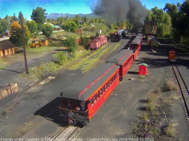 9.9.16 The conductor and passenger are talking on the platform of the Colorado.jpg