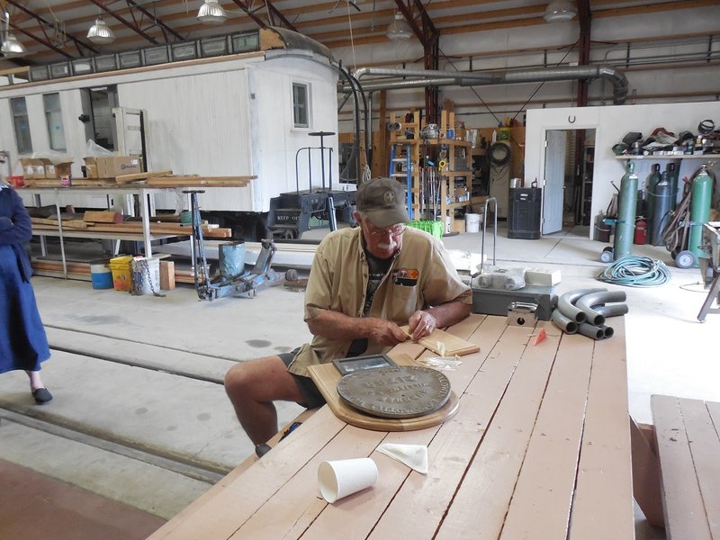 Craig McMullen assembles recognition plaque for 463 shop crew.jpg