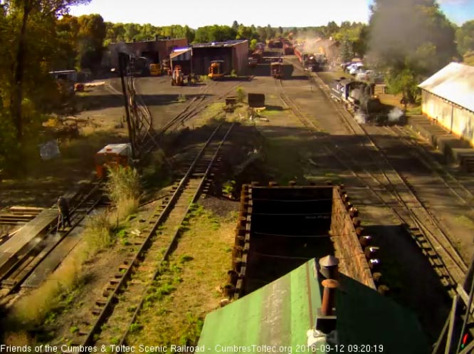 9.12.16 The 463 pulls into the lead for the coal dock as we see 216 at the station and probably Julian at the pit washing it down.jpg