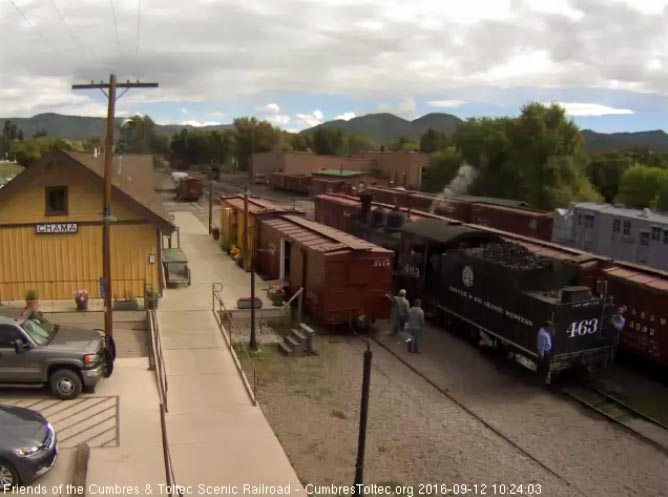 9.12.16 The 463 backs by the depot with a student and instructor on the tender.jpg