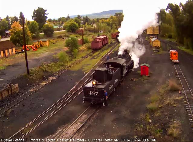 9.14.16 The 487 backs down the main with not the hostler on the tender but that early bird road crew member.jpg