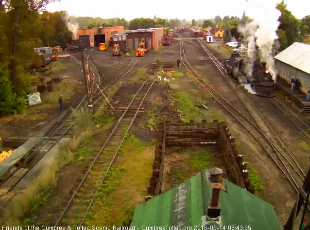 9.14.16 The 487 now moves toward the coal dock with people watching from the wood shop dock.jpg