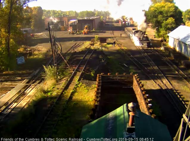 9.15.16 489 moves into the coal dock lead as 463 couples onto the extra coaches.jpg