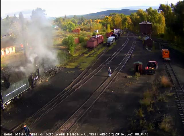 9.21.16 463 has coal added as the other hostler washes the cab down.jpg