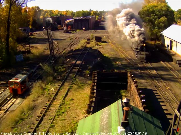 9.25.16 Under a cloud of smoke and steam, the 487 comes by the wood shop as the speeder passes on the house lead.jpg