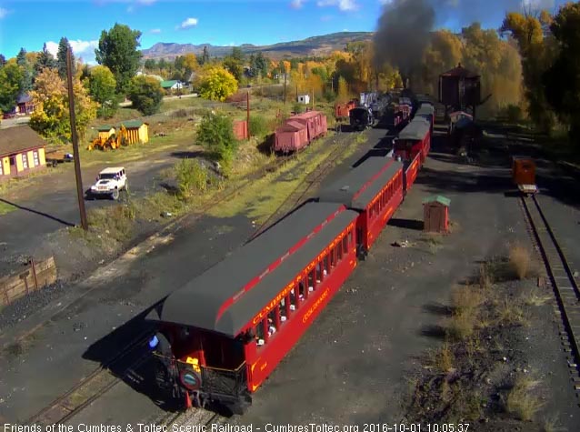 10.1.16 The conductor is looking over the train as the New Mexico pass the tipple.jpg