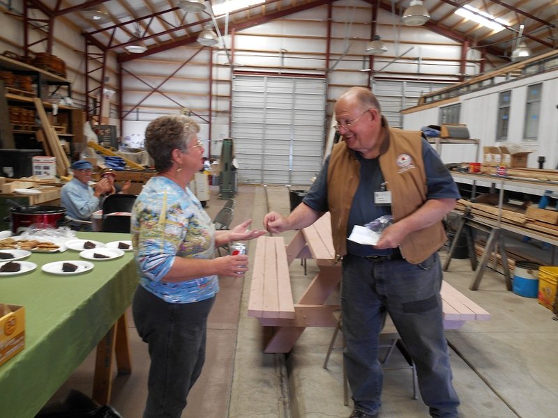 Patty Hanscom receives her 15-year pin from PC Co-Chair John Engs.jpg