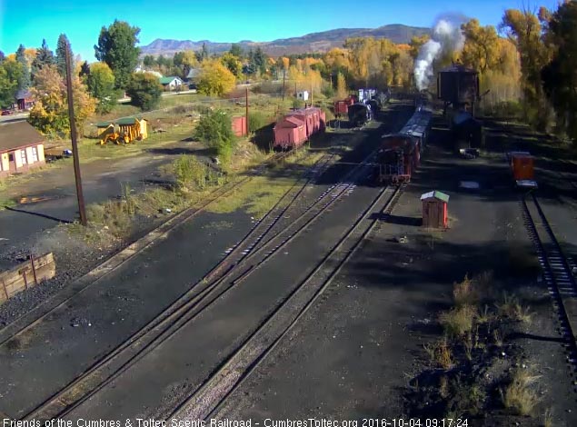 10.4.16 463 pulls out of Chama with 7 stock cars and a caboose.jpg
