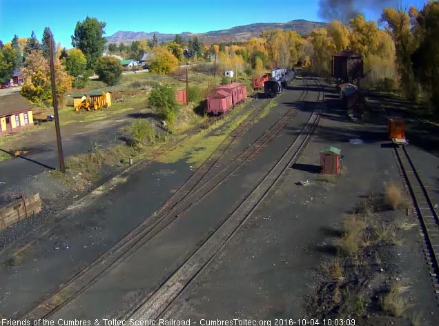 10.4.16 The last 2 cars of the train are seen as they round the curve to the Rio de Chama.jpg