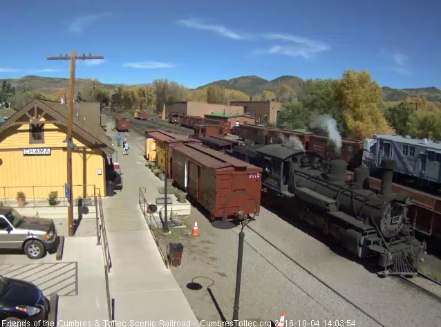 10.4.16 463 and caboose pass the depot on the way to the wye.jpg