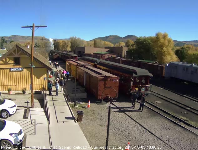 10.5.16 The conductor climbs onto the Colorado after giving the hi ball.jpg