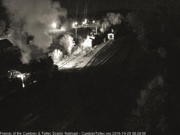 10.20.16 The firebox glow lights the cab of 489 as it sits at the coal dock.jpg