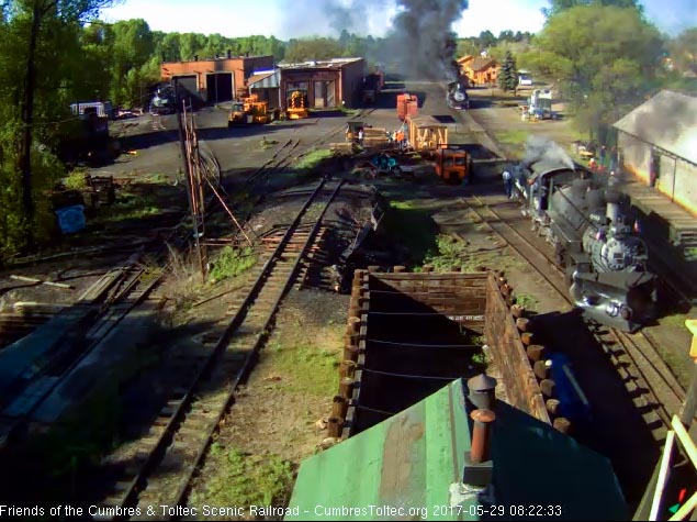 5-29-17 489 passes the wood shop as 463 waits for the road crew.jpg