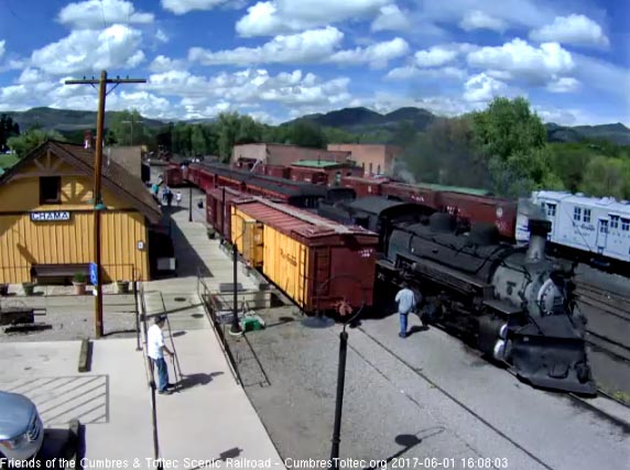 6-1-17 487 slows for its stop under a beautiful afternoon sky.jpg