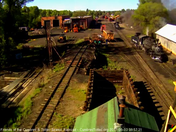 6-3-17 489 pulls past the wood shop as it heads to the dock.jpg