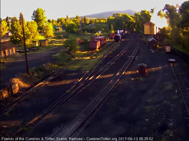 6-13-17 489 is now at the tank whose side glows in the early morning sun.jpg