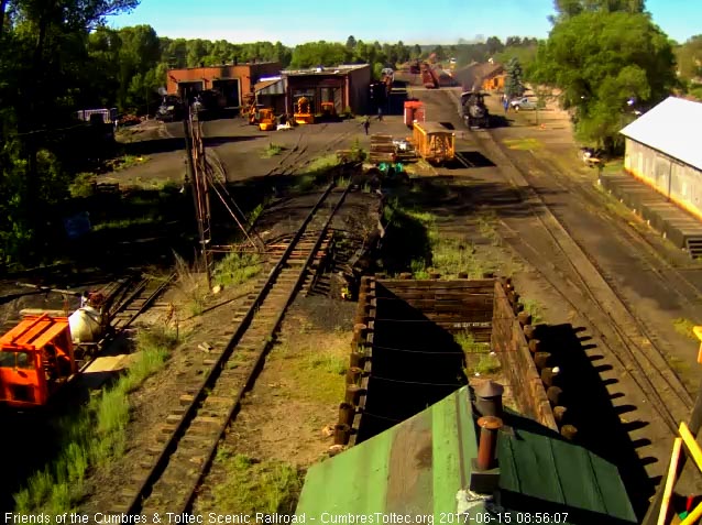 6-15-17 484 now waits for its second road crewman to board as we see the fire patrol speeder filling its water trailer.jpg