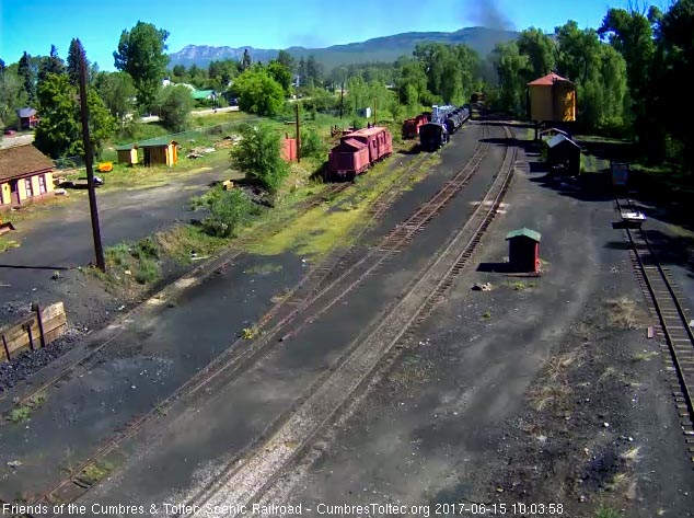 6-15-17 The last cars round the curve at the north end of Chama.jpg
