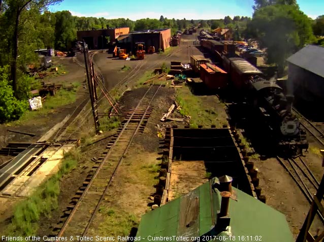 6-18-17 463 comes out of south yard with a string of cars.jpg